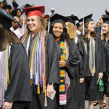 A group of graduates. Link to Gifts of Appreciated Securities