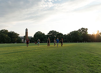 Students walking through campus. Link to Life Stage Gift Planner Under Age 60 Situations.