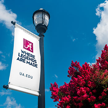 Light post with UA sign. Read about Gifts of Real Estate